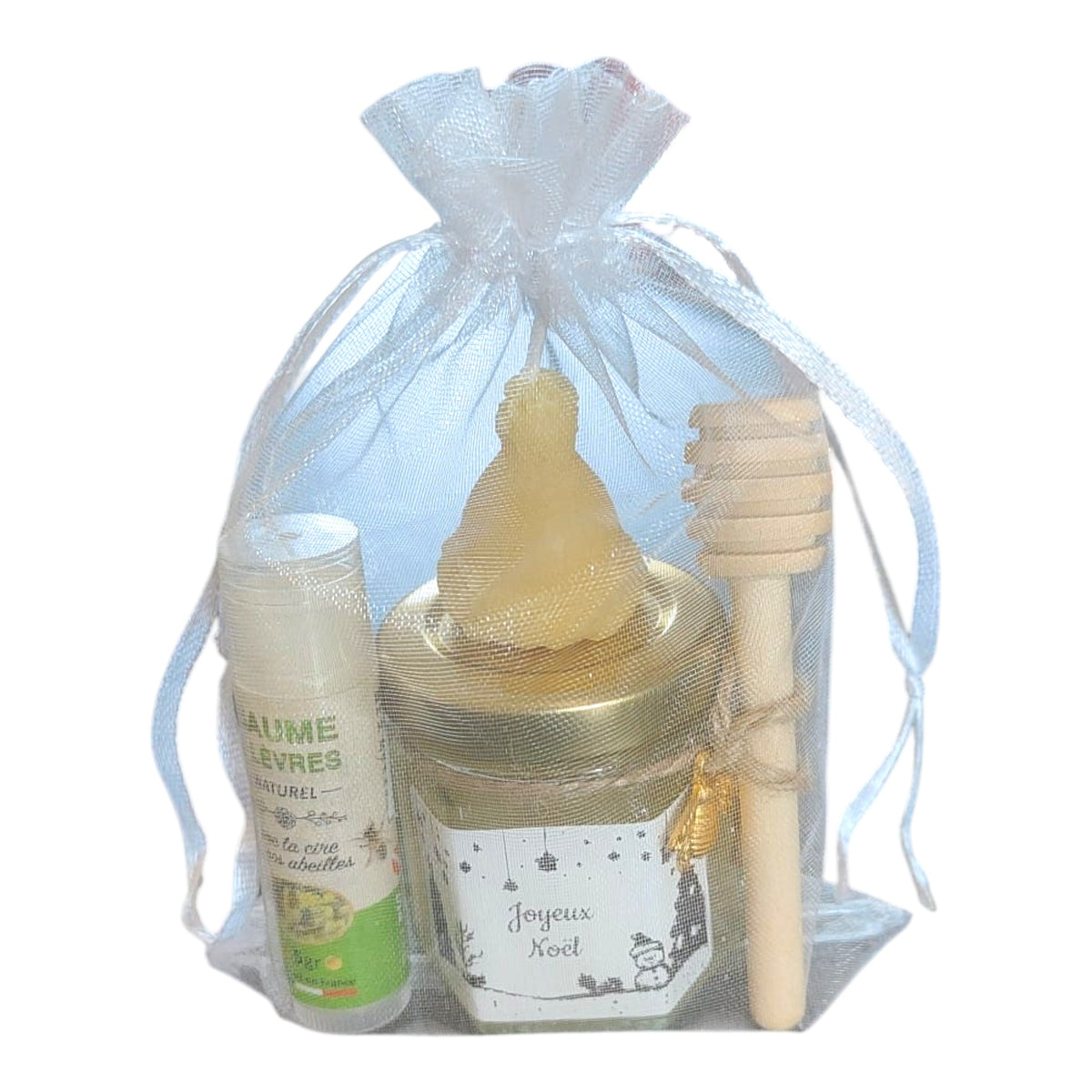 Cadeau de fin d'année artisanal avec miel, baume à lèvres et bougie en cire d'abeille présenté dans un sachet cadeau personnalisé.
