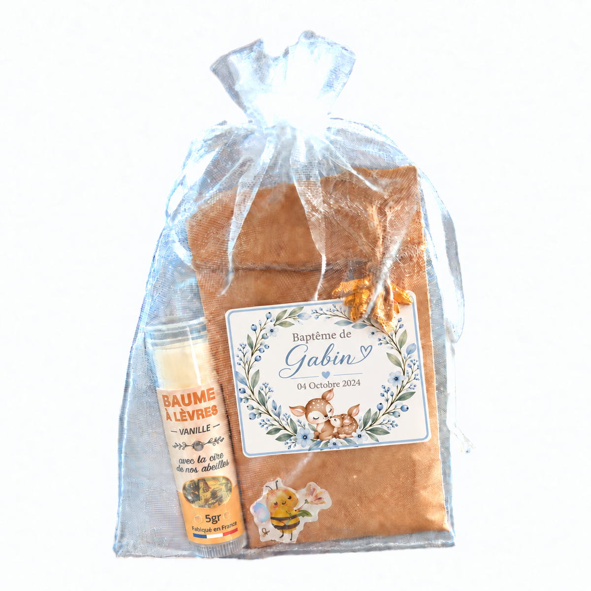 Cadeau invité de baptême personnalisé avec sachet de graines, baume à lèvres et motif faon fleuri