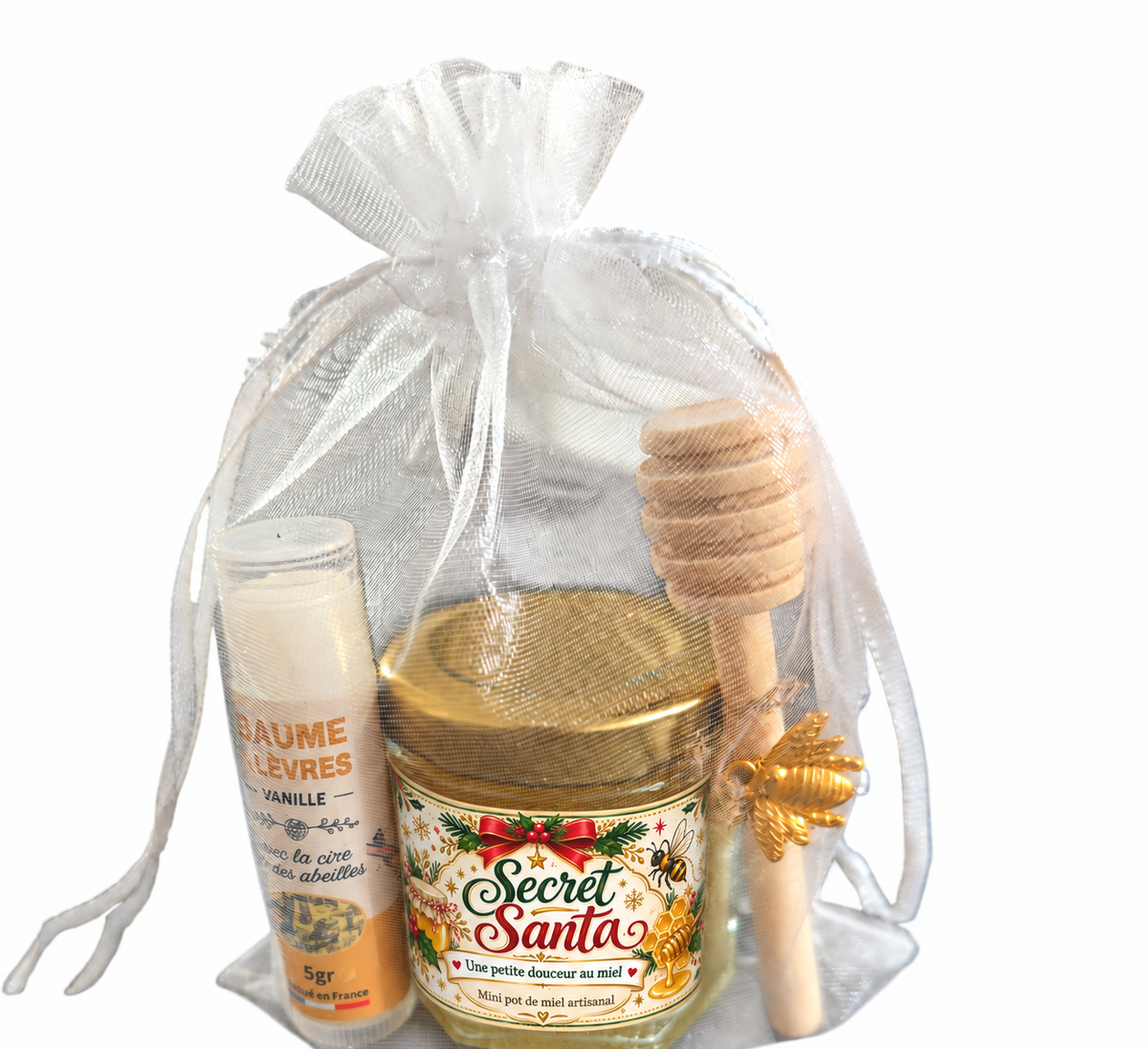 Coffret cadeau Secret Santa personnalisé avec mini pot de miel artisanal, baume à lèvres vanille et cuillère à miel, présenté dans un sachet organza blanc.