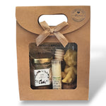 Coffret baptême pour invité avec miel artisanal, baume à lèvres et bougie ange en cire d’abeille