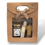 Idée cadeau baptême avec coffret miel artisanal, baume à lèvres naturel et bougie ange artisanale