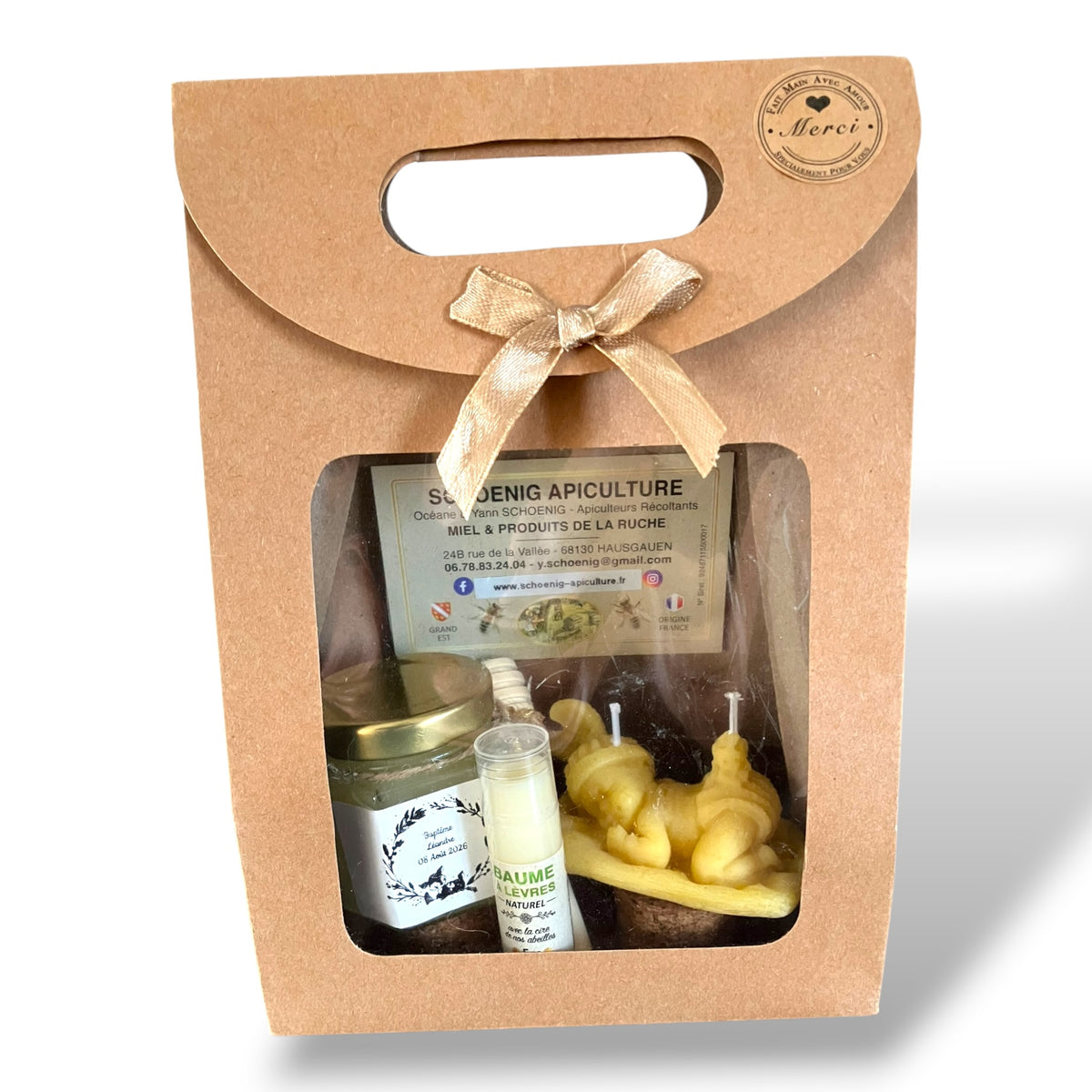 Coffret baptême personnalisé avec miel artisanal, bougie bébé couché en cire d’abeille et baume à lèvres naturel