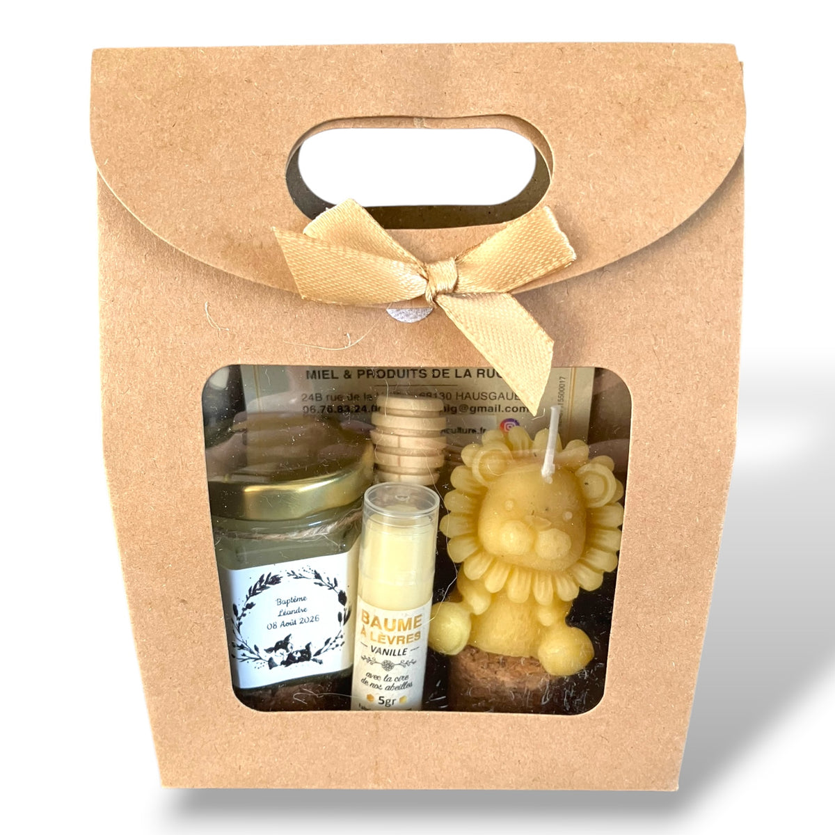 Coffret baptême personnalisé avec miel artisanal, bougie lion en cire d’abeille et baume à lèvres vanille