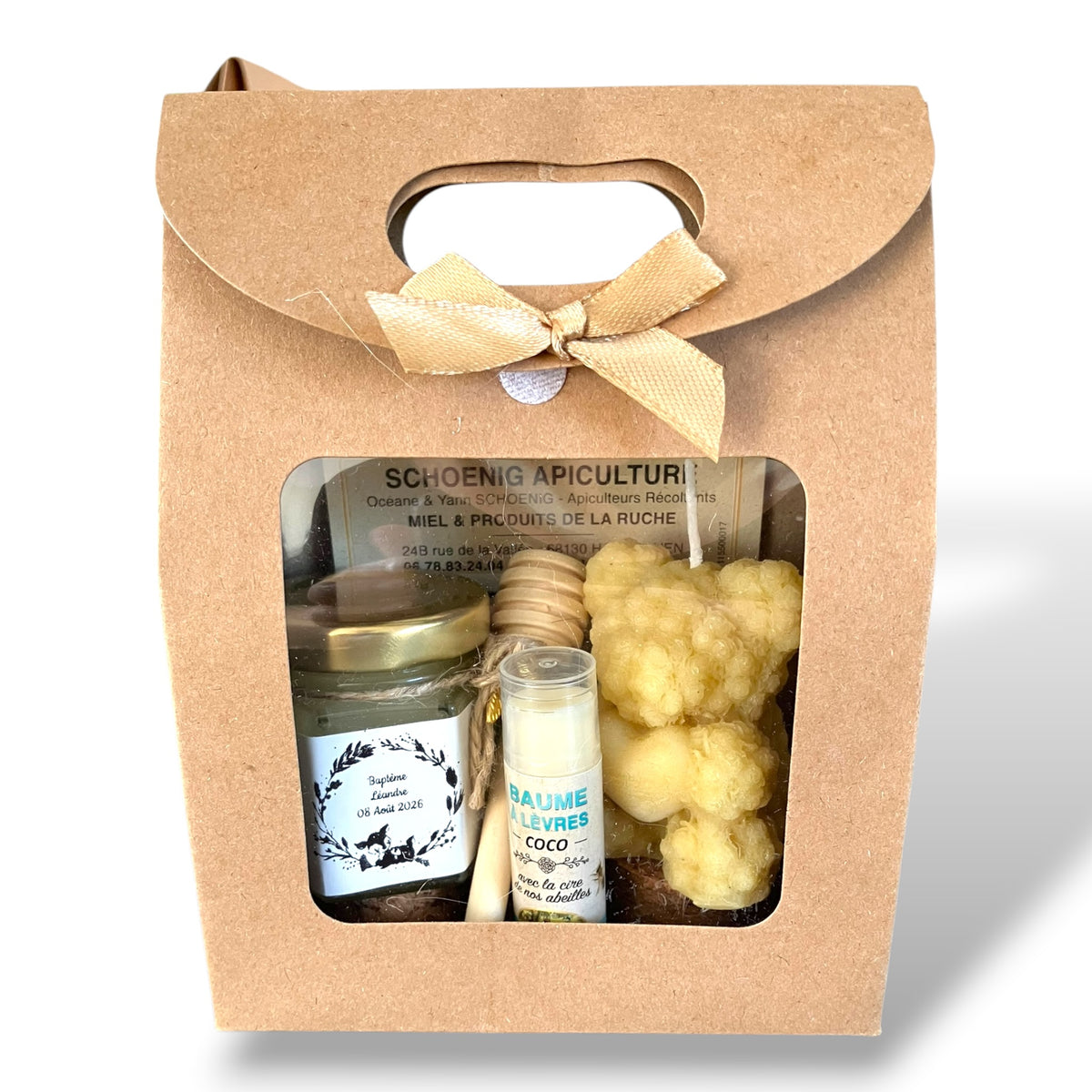 Coffret baptême personnalisé avec miel artisanal, bougie cœur en cire d’abeille et baume à lèvres coco