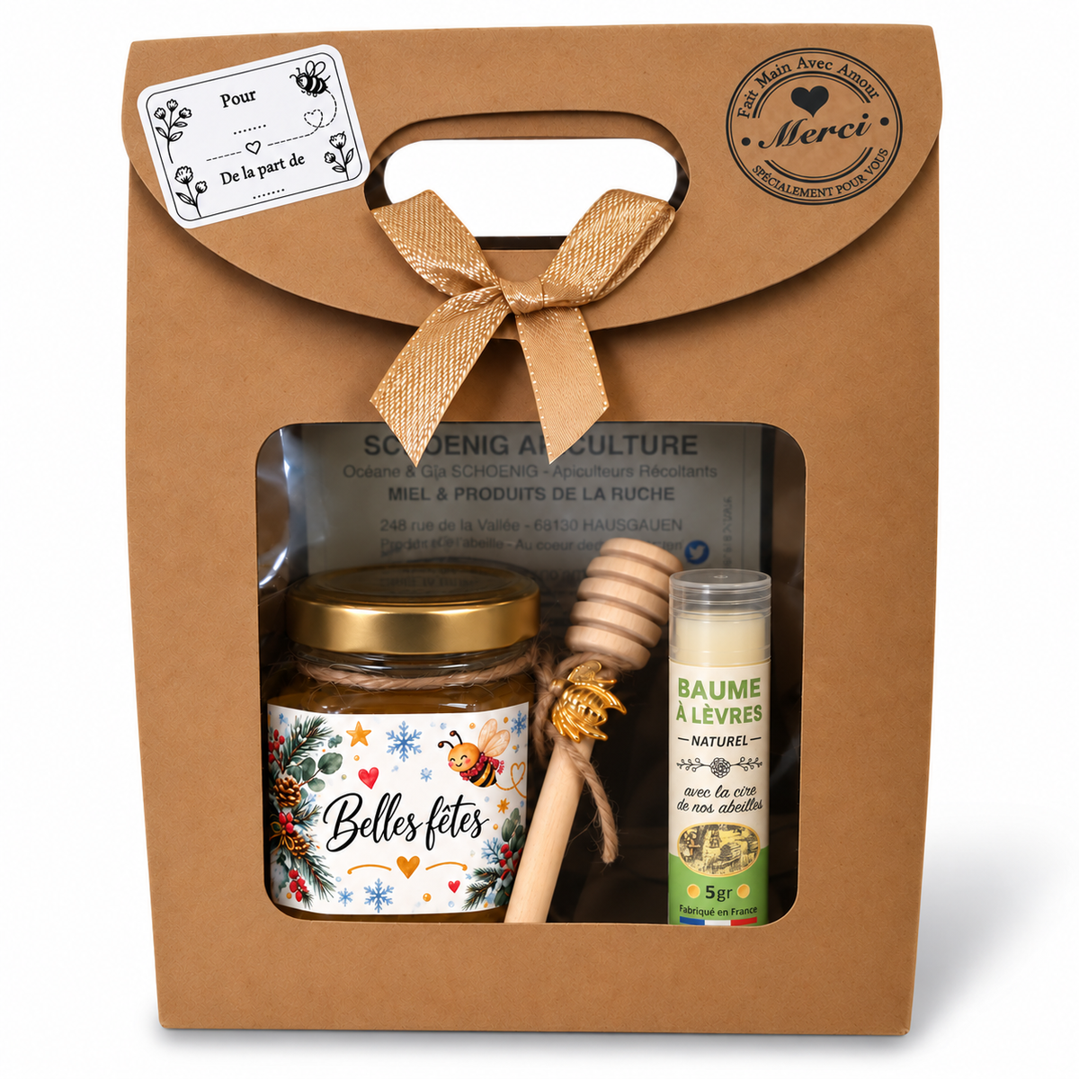 Coffret cadeau de Noël artisanal avec pot de miel étiquette Belles fêtes, cuillère à miel et baume à lèvres naturel.