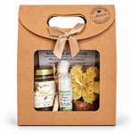Coffret cadeau entreprise personnalisé avec miel artisanal français, étiquette Merci avec logo, bougie en cire d’abeille et baume à lèvres naturel, idéal pour remercier clients et collaborateurs à Noël.