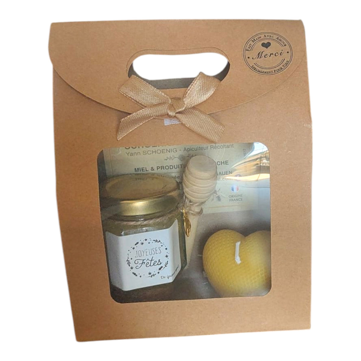 Coffret cadeau de Noël avec étiquette Joyeux Noël, miel artisanal, bougie en cire d'abeille et cuillère à miel.
