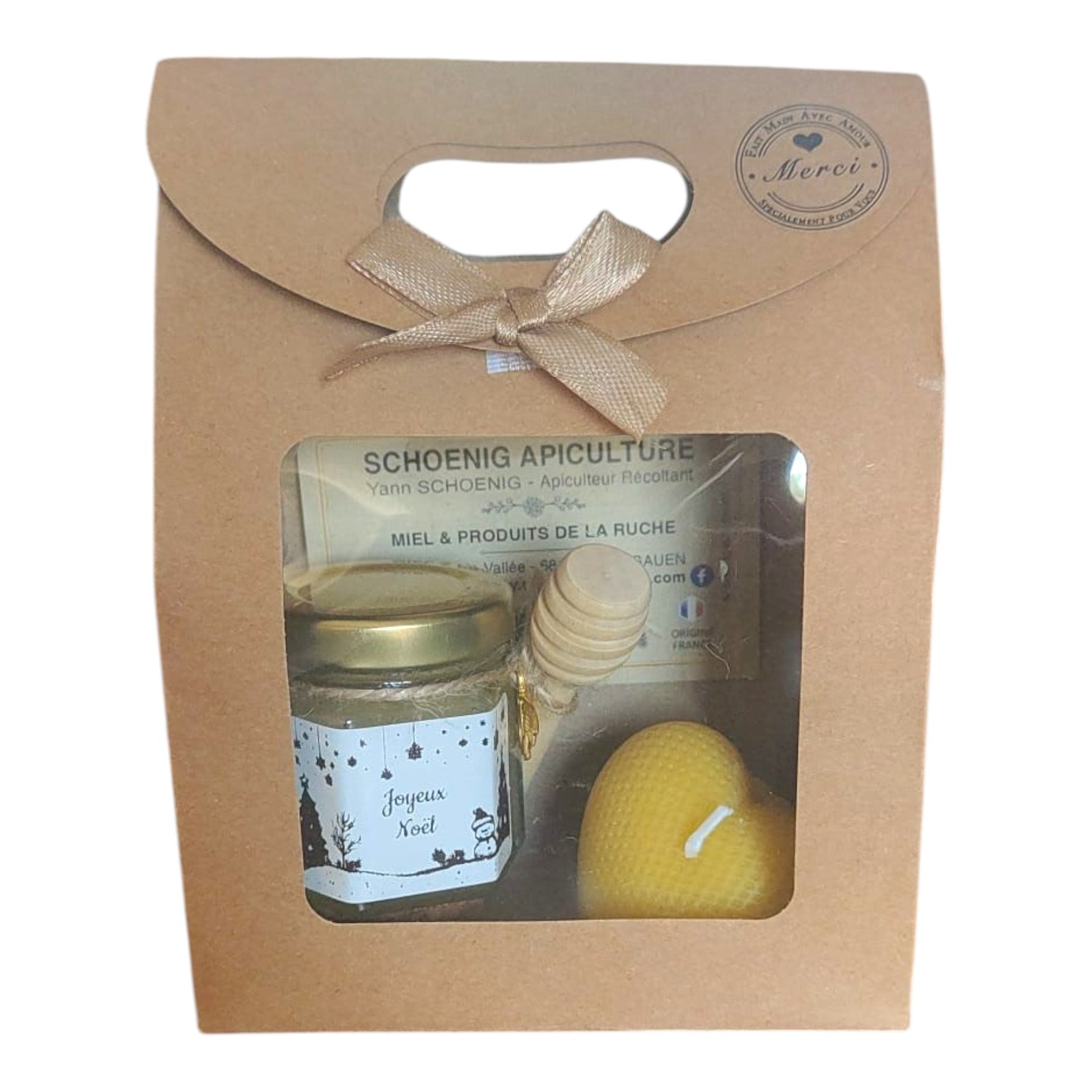 Coffret cadeau artisanal de Noël avec miel de nos ruches, bougie en cire d'abeille en forme de cœur et cuillère à miel, prêt à offrir.