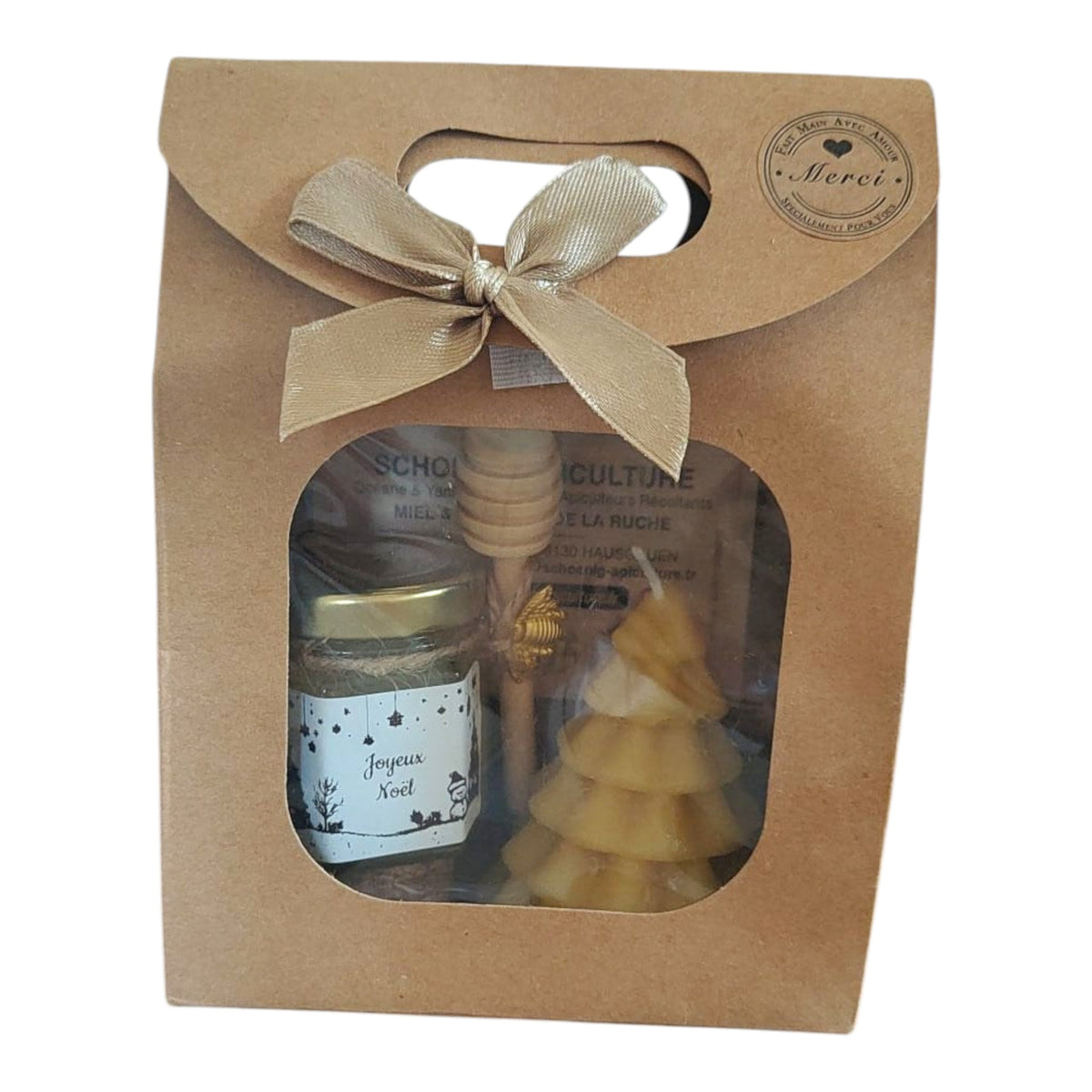 Coffret cadeau de Noël artisanal avec pot de miel, bougie sapin en cire d'abeille, cuillère à miel en bois et étiquette Joyeux Noël.