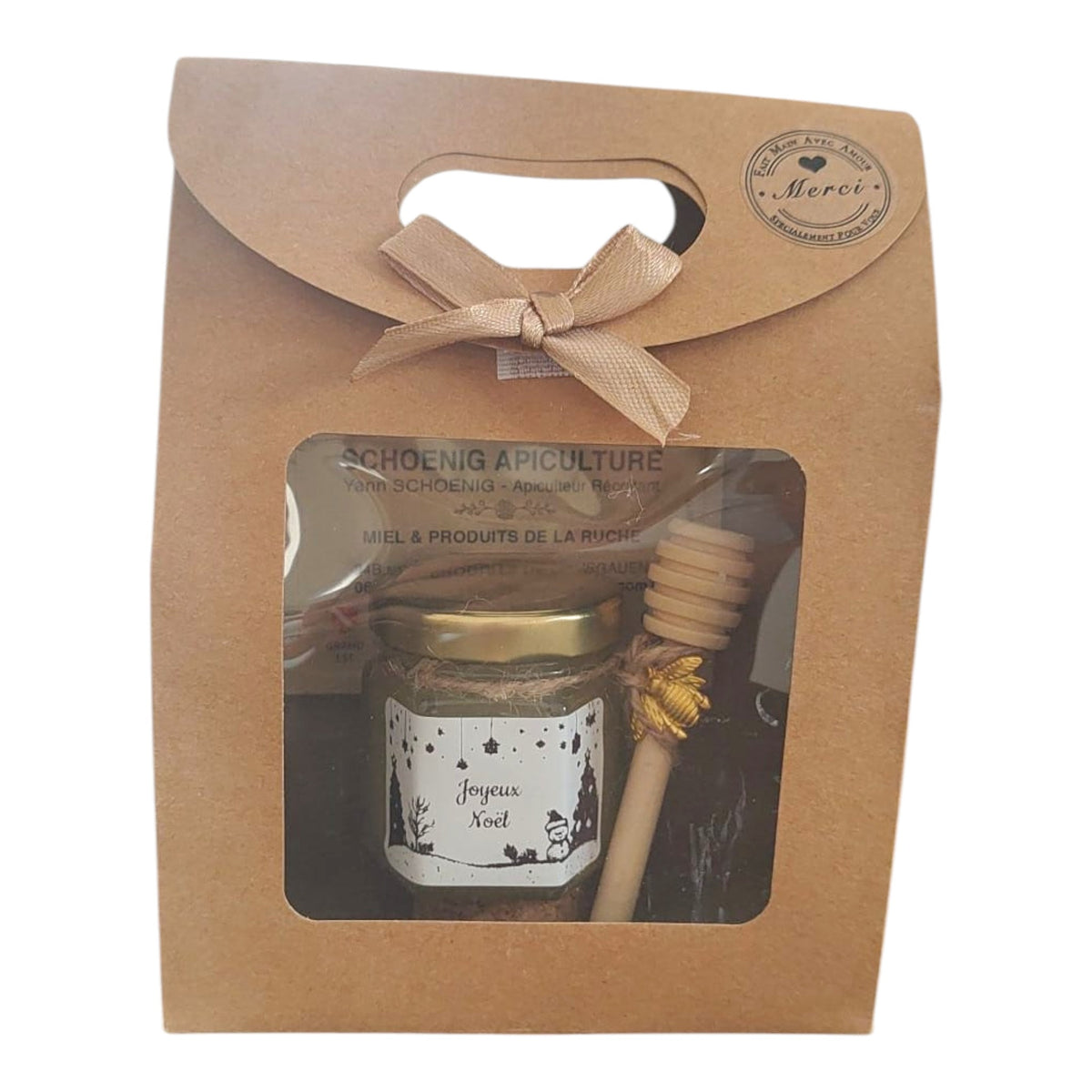 Coffret cadeau de Noël avec mini pot de miel artisanal personnalisé, cuillère à miel en bois, breloque abeille et coffret kraft prêt à offrir.