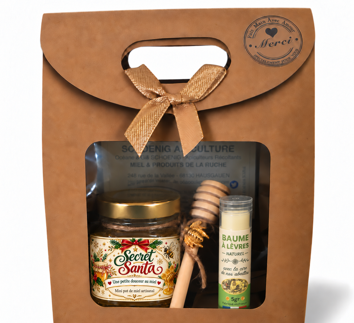 Coffret cadeau Secret Santa avec pot de miel artisanal personnalisé, baume à lèvres naturel et cuillère à miel, présenté dans un emballage kraft avec ruban doré.