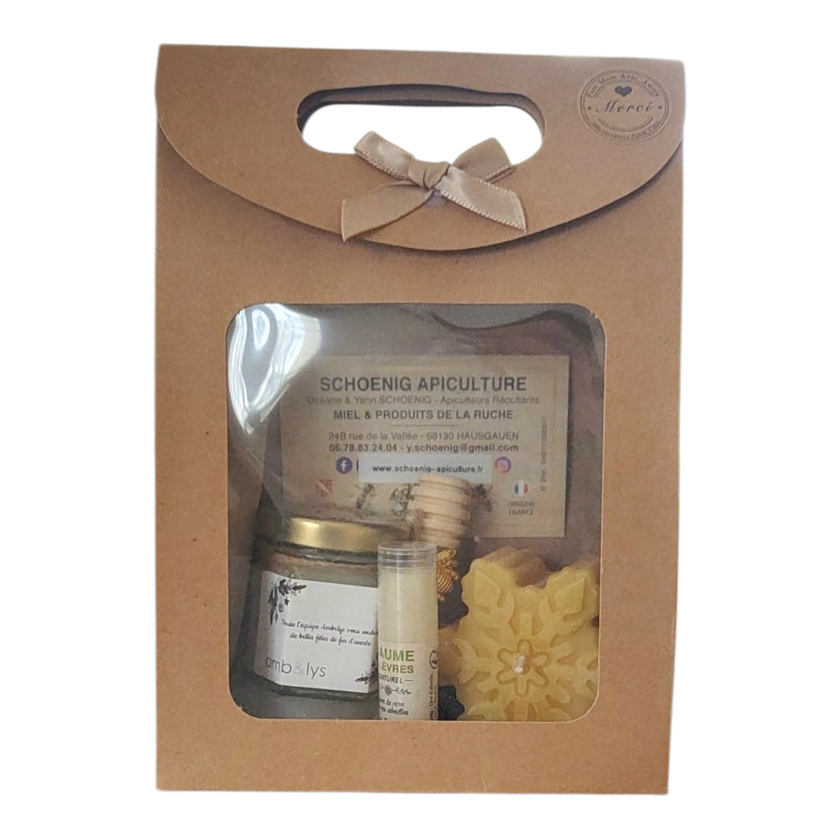 Coffret miel personnalisé avec baume à lèvres à la cire d’abeille et bougie flocon, cadeau client, collaborateur ou CSE de fin d’année présenté dans un coffret kraft avec fenêtre transparente