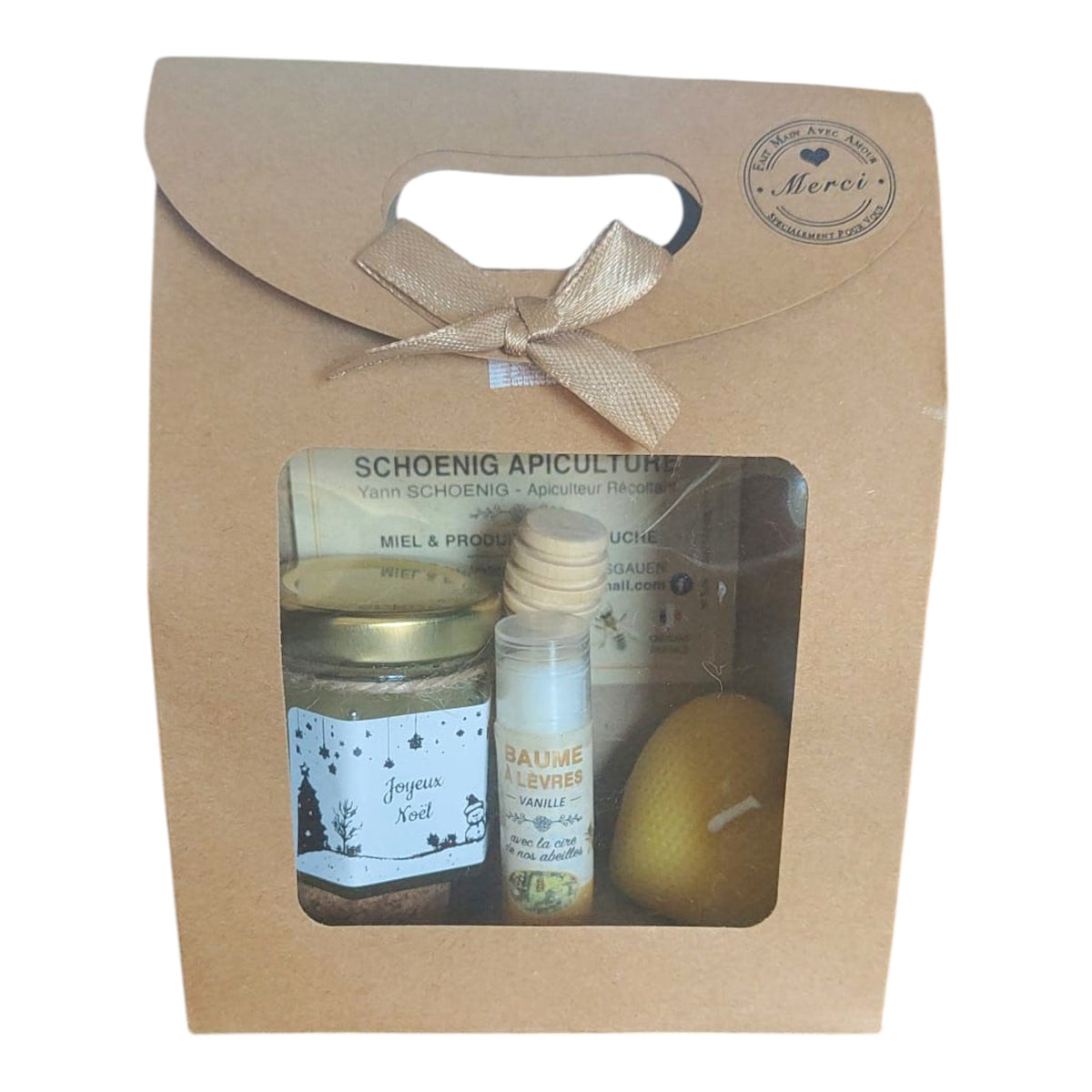 Coffret cadeau Noël avec miel, baume coco, bougie cœur et étiquette Joyeuses Fêtes.