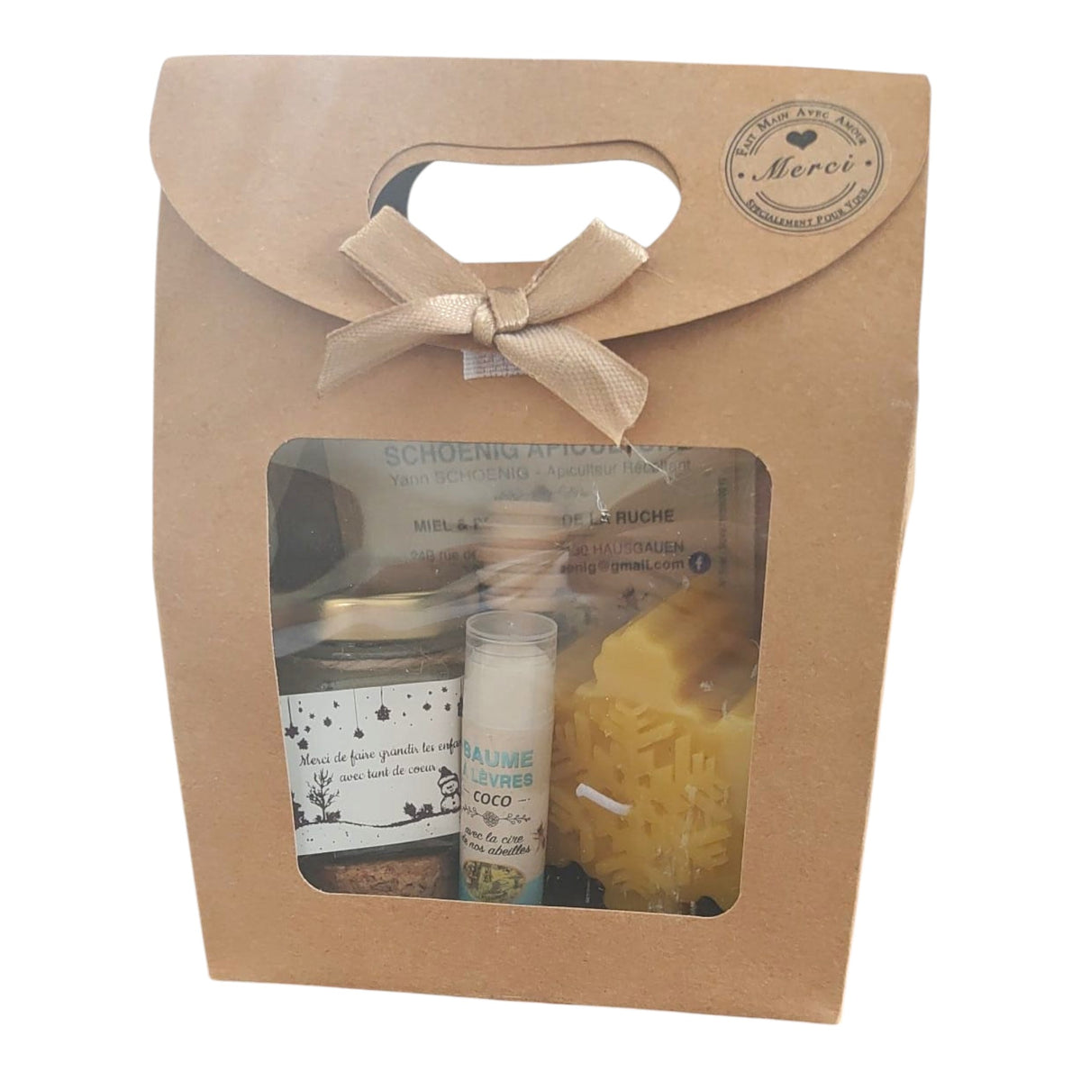 Coffret cadeau miel, baume coco, bougie flocon de Noël et étiquette Merci de faire grandir les enfants avec tant de cœur.