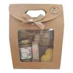 Coffret cadeau personnalisé avec miel, baume framboise, bougie cœur et étiquette texte libre.