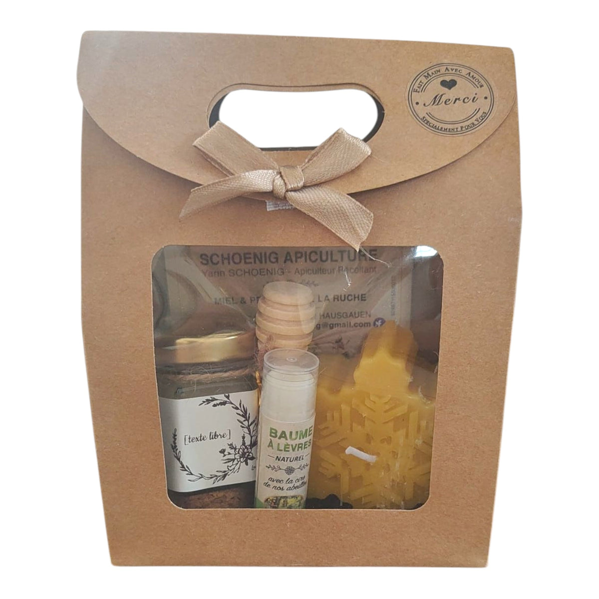 Coffret cadeau personnalisé avec miel, baume framboise, bougie flocon de Noël et étiquette texte libre.