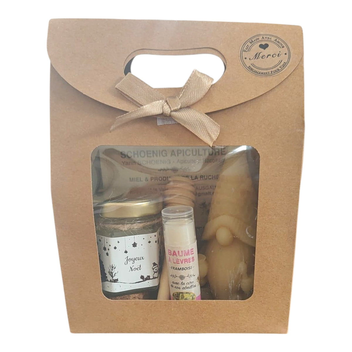 Coffret cadeau Noël avec miel, baume framboise, bougie lutin en cire d'abeille et étiquette Joyeux Noël.