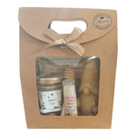 Coffret cadeau Noël avec miel, baume framboise, bougie lutin en cire d'abeille et étiquette Joyeux Noël.