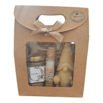 Coffret cadeau personnalisé avec miel, baume naturel, bougie lutin et étiquette texte libre.