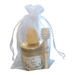 Idée de cadeau de remerciement avec miel artisanal, bougie en cire d'abeille et cuillère à miel en bois.