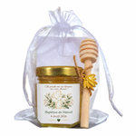Mini pot de miel personnalisé pour baptême avec étiquette Marcel, croix, colombe et feuillage, accompagné d'une cuillère à miel en bois et pochon blanc