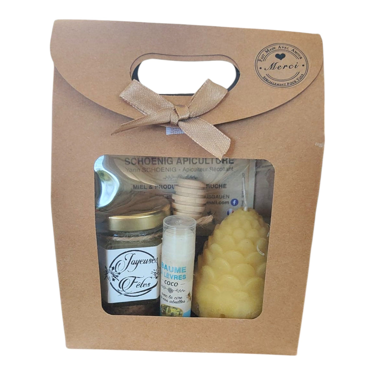 Coffret cadeau Noël avec miel, baume coco, bougie pomme de pain et étiquette Joyeuses Fêtes.
