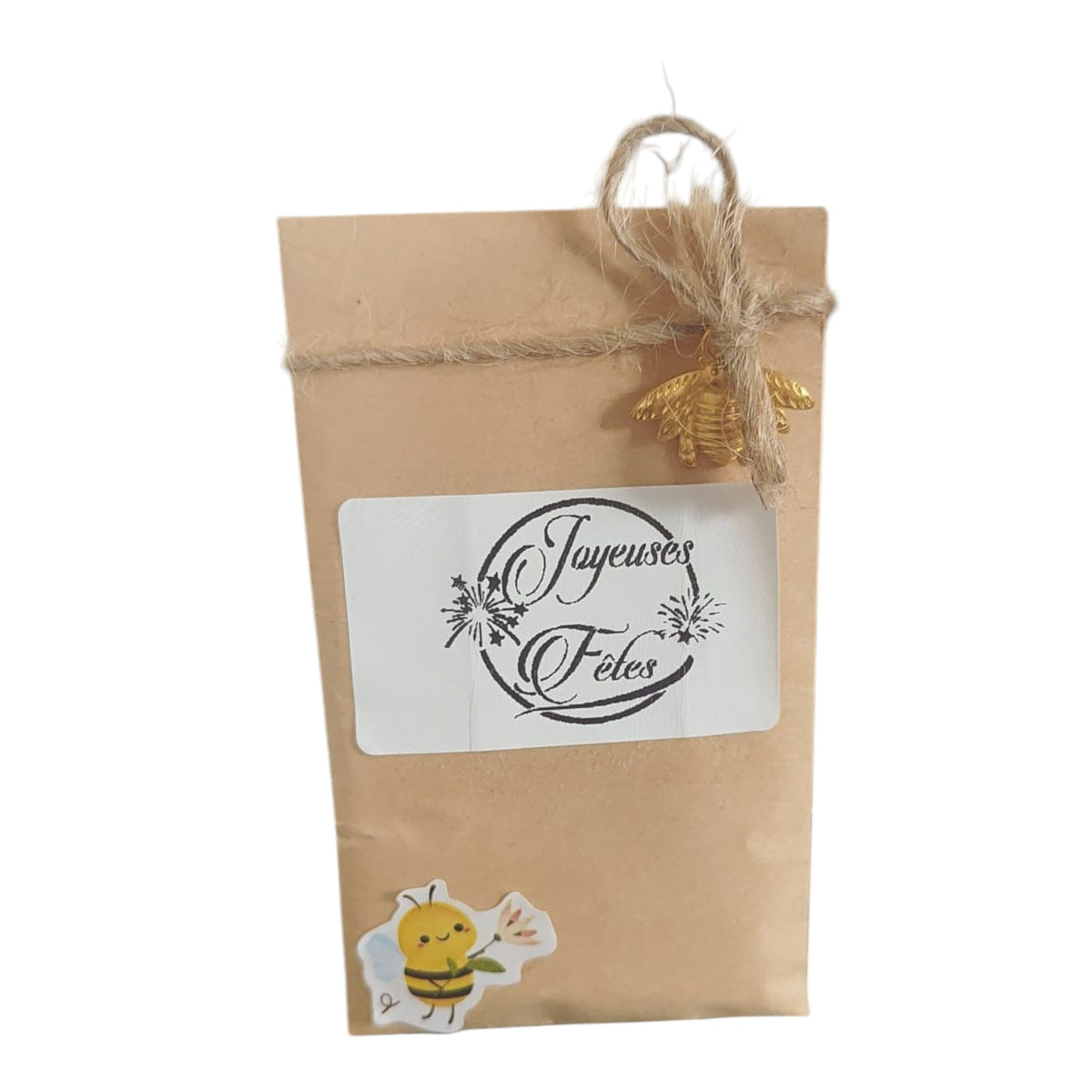 Sachet de graines personnalisé Joyeuses Fêtes, décoré d'une breloque abeille dorée, idéal comme cadeau de Noël artisanal.